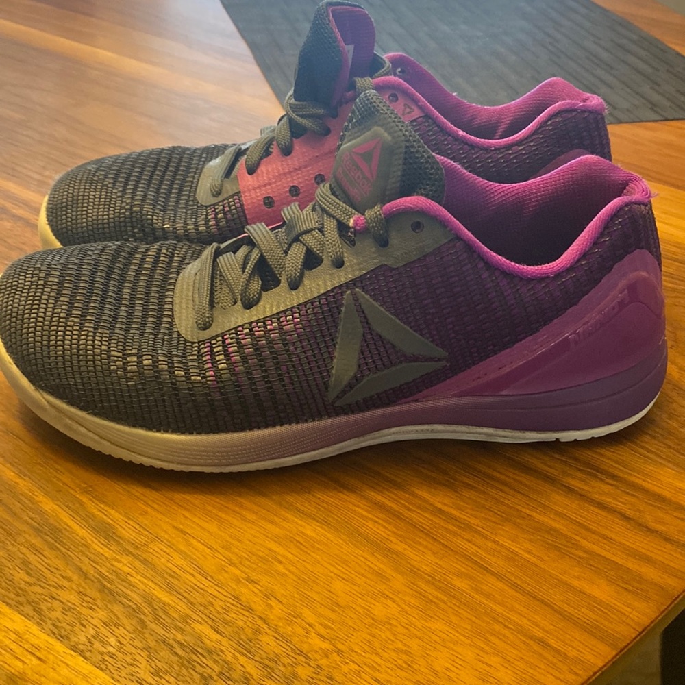 Reebok Cross Training shoe. Size 7.5. Color black and purple.